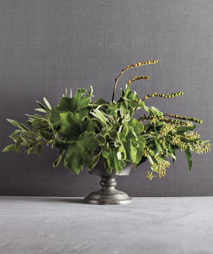 |green foliage centerpiece and platinum votive holders