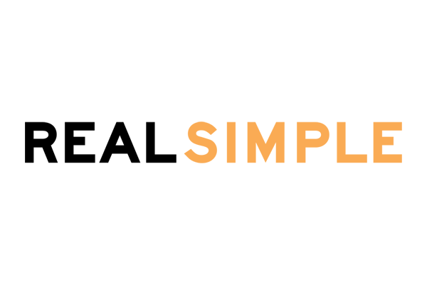 a black and orange logo for real simple