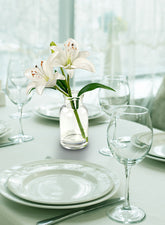 White Lilies in Milk Bottle Vase